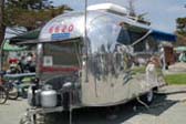Highly Polished 1965 Airstream Caravel Trailer, Front View